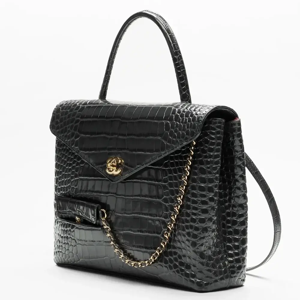 Chanel Maxi Flap Bag with Top Handle angle view